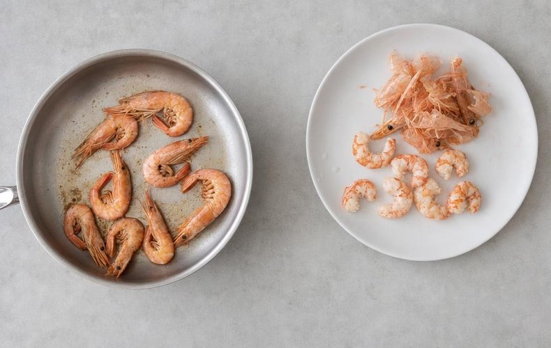 Artichoke Cups with Seafood Salad, step 4: shrimp cooking in a pan