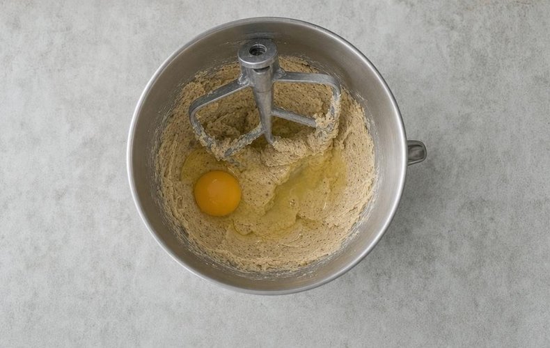 Baci di Dama Cake, step 2: adding the hazelnut flour, egg yolk and egg white