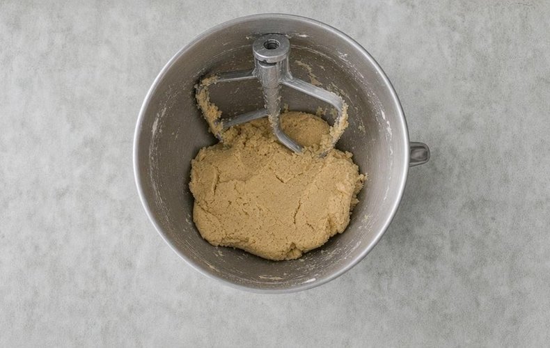 Baci di Dama Cake, step 3: mixing in the flour and baking powder