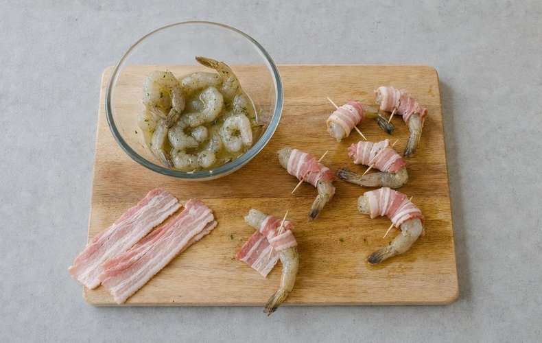 Bacon-Wrapped Lime Shrimp, step 3: shrimp wrapped in bacon and secured with toothpicks