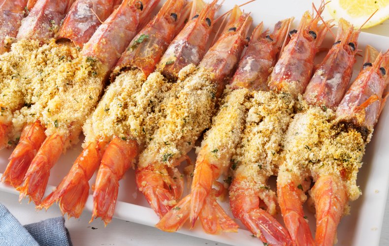 Baked jumbo shrimp au gratin