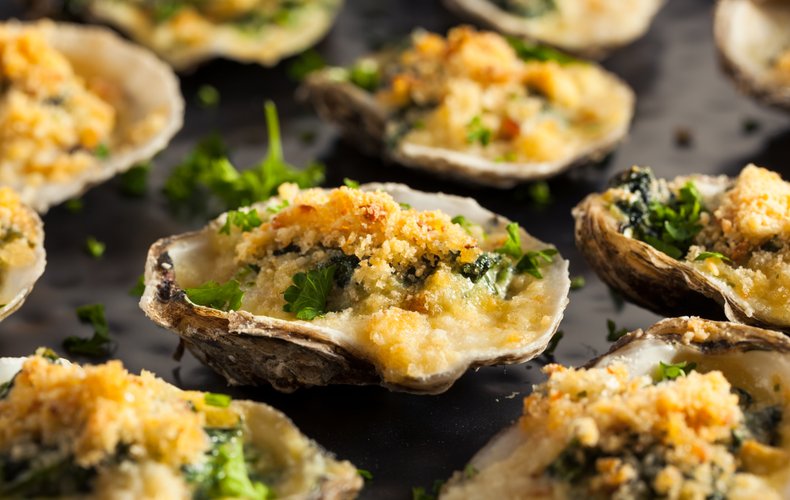 Baked oysters with spinach and Grana Padano