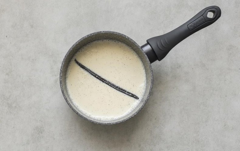 Cream, milk, sugar and vanilla seeds in a small saucepan