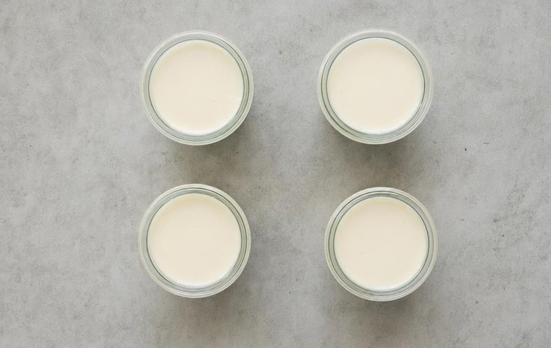 Panna cotta poured into single-serving glass molds