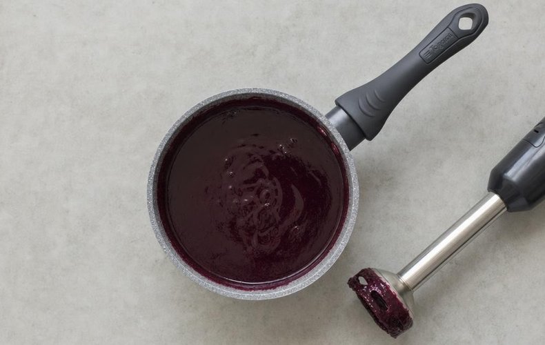 Smooth blueberry sauce blended with an immersion blender