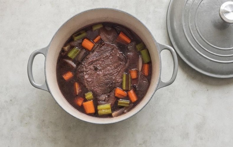 Braised Veal Cheek with Mashed Potatoes, step 2: veal cheek braising with celery, carrot, onion and cloves