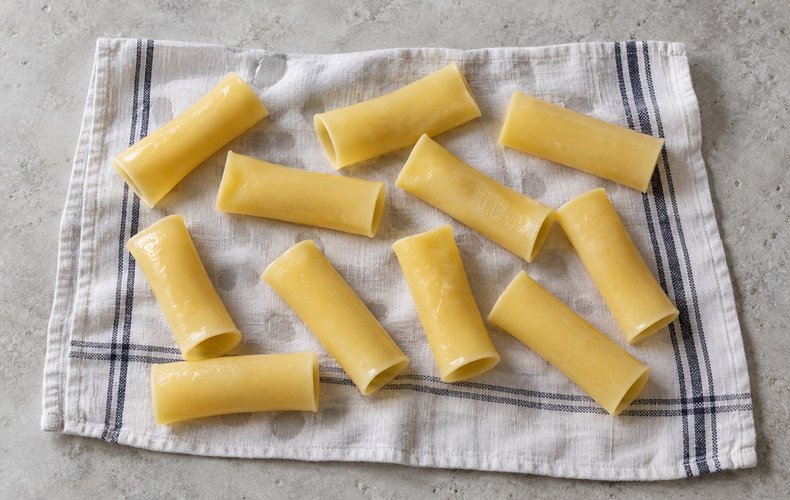 Calabrian Stuffed Schiaffettoni, step 1: blanched cannelloni cooling on a kitchen towel