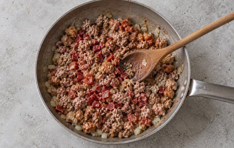 Calabrian Stuffed Schiaffettoni, step 2: ground pork, sausage and salami browning with onion