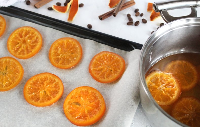 Orange slices cooking in sugar syrup