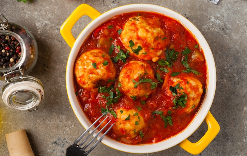 Bread dumplings with tomato sauce