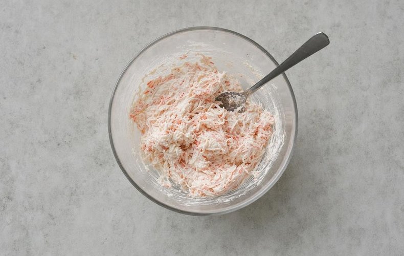 Robiola, Philadelphia and crab meat mixed in a bowl