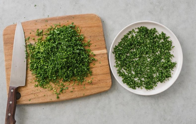 Cheese and Herb Christmas Trees, step 2: finely chopped herbs on a plate
