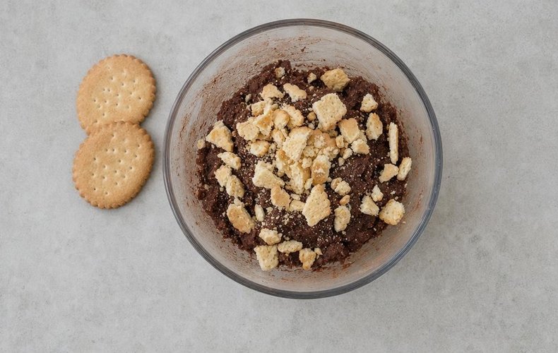 Chestnut Salami, step 6: adding the broken cookies