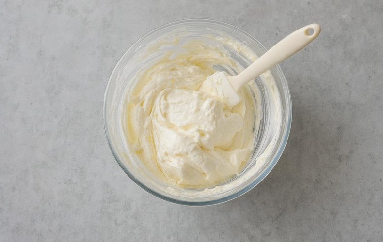 Chilled Lemon Cream, step 4: folding the yogurt into the whipped cream