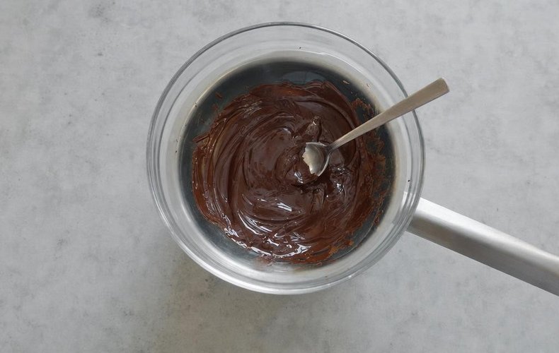 Chocolate-Dipped Mandarins, step 2: dark chocolate melting in a double boiler