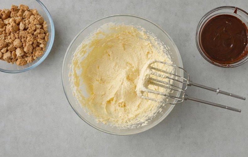 Chocolate Salami with Amaretti Cookies, step 2: butter, sugar and eggs beaten with an electric mixer