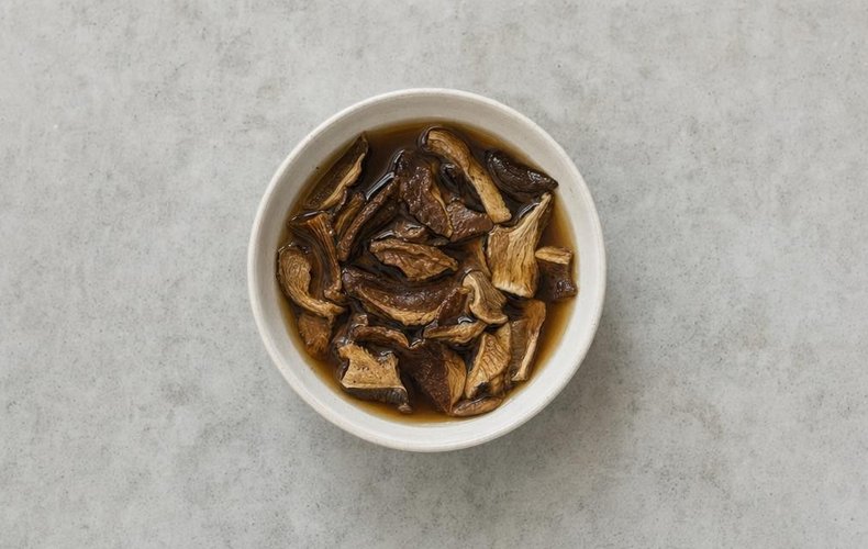 Christmas Eve Gnocchi, step 4: dried porcini mushrooms soaking in water