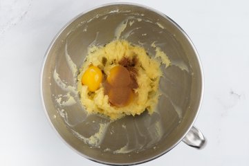 Adding the egg yolks, vanilla, salt and cinnamon