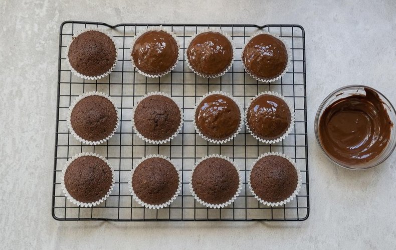 Christmas Reindeer Muffins, step 5: muffins glazed with melted dark chocolate