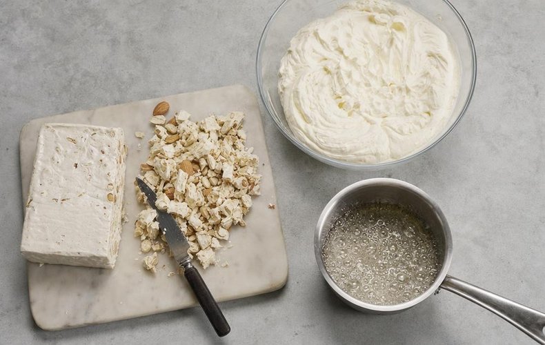 Christmas Star Torrone Semifreddo, step 1: chopped torrone, whipped cream and sugar syrup
