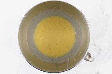 Adding butter, sugar, and eggs to the yeast mixture