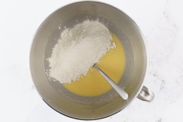 Working the flour into the cinnamon roll dough