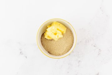 Brown sugar, butter, and cinnamon in a bowl