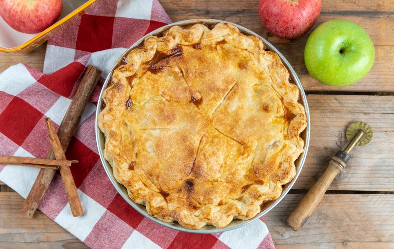 Apple pie cut into slices after cooling