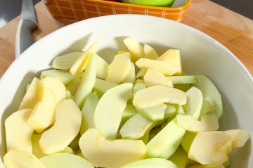 Apple wedges in a large bowl