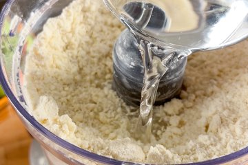 Ice-cold water added to the pie crust mixture