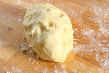 Pie crust dough divided in two and wrapped in plastic wrap