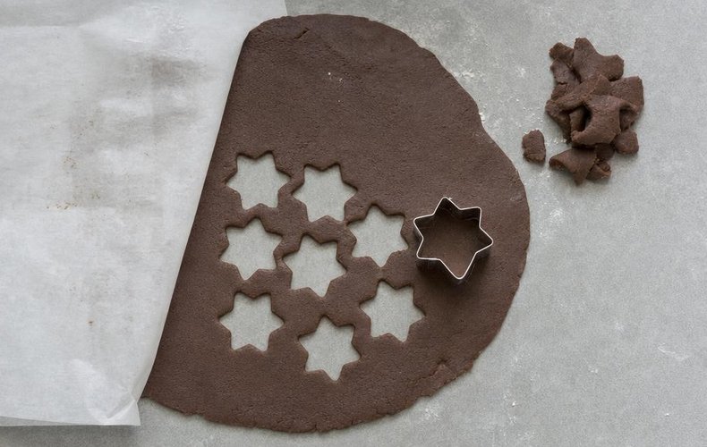 Cocoa Christmas Cookies, step 3: stars cut from the rolled-out cocoa dough