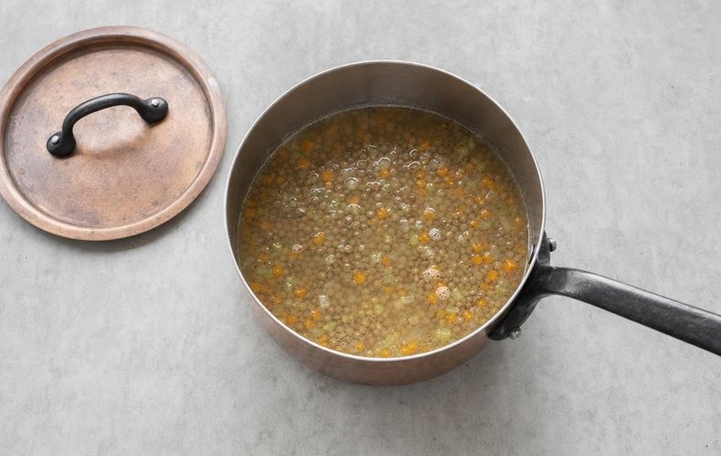 Creamy Lentil Soup with Crispy Bacon, step 2: lentils cooking in water with the vegetables