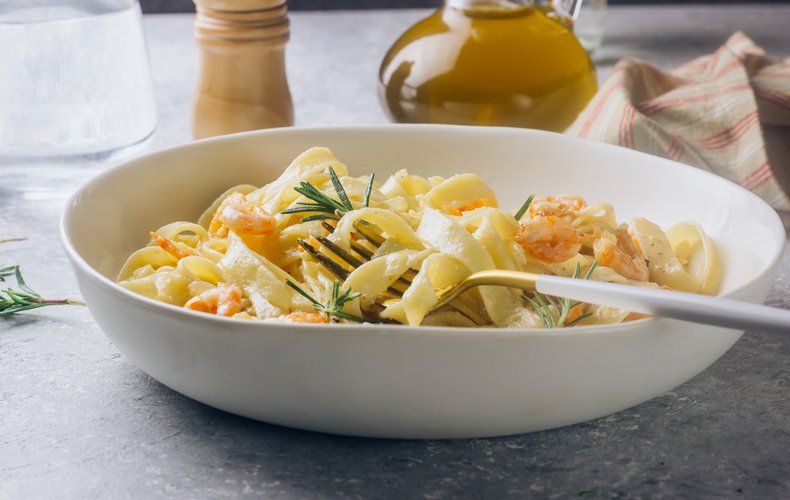 A plate of creamy shrimp tagliatelle