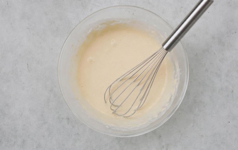 Crepe bundles with mushrooms and béchamel, step 1: whisking the flour and milk