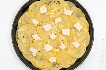 Covering with the remaining potatoes