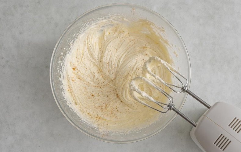 Gingerbread Cupcakes, step 5: mascarpone and whipped cream frosting in a bowl