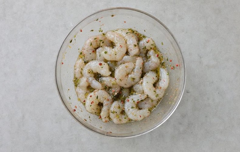 Grilled Shrimp Skewers, step 2: shrimp marinating with vermouth and herbs