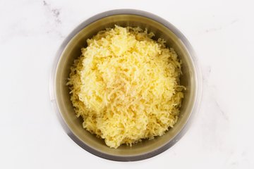 Homemade Mashed Potatoes, step 3: seasoning the potatoes with salt and nutmeg