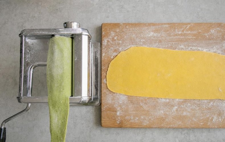 Homemade Paglia e Fieno Tagliatelle, step 5: yellow and green tagliatelle dusted with semolina