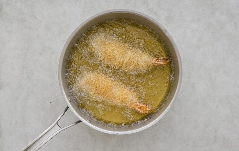 Kataifi-Wrapped Jumbo Shrimp, step 4: shrimp frying in hot oil
