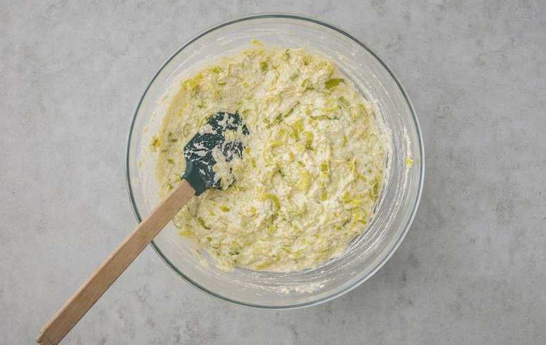 Leek Savory Pie, step 3: ricotta, Grana Padano, egg and leeks in a bowl