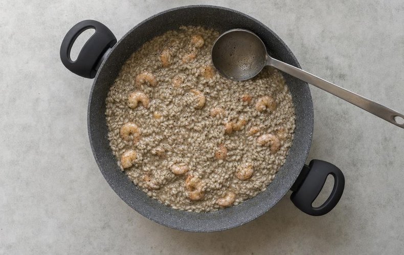 Licorice and Shrimp Risotto, step 3: licorice powder and shrimp stirred into the risotto