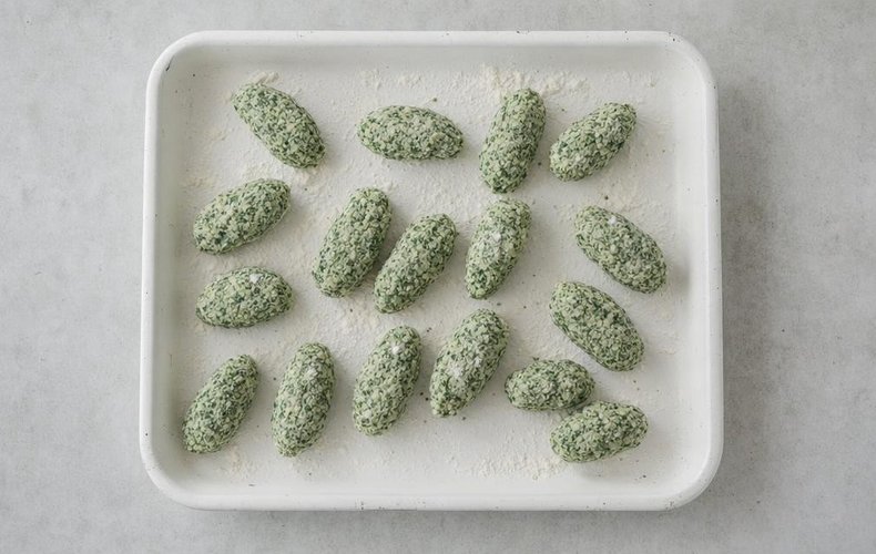 Malfatti, step 5: shaped malfatti on a floured tray