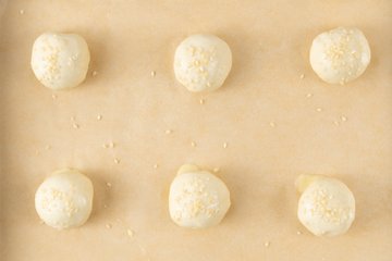 Shaping the dough into balls on the work surface