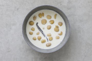 Monte Bianco, step 2: cooking the chestnuts in milk and mashing them with a potato ricer