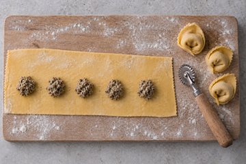Mushroom Tortelloni, step 3: shaping the half-moon tortelloni