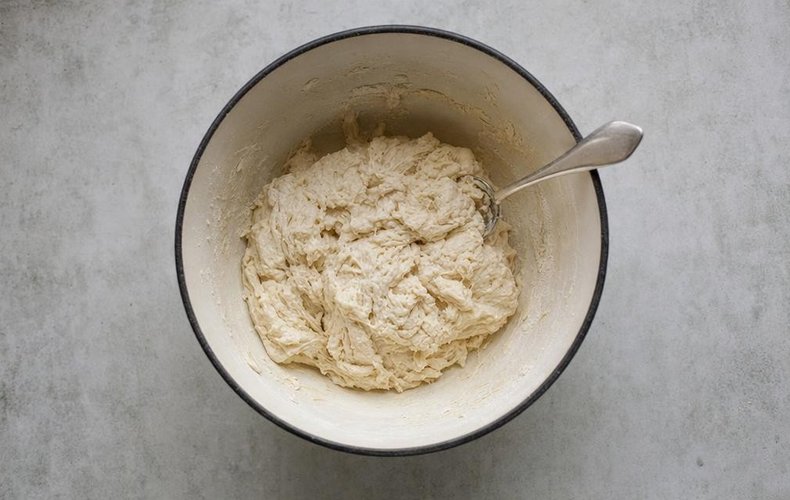 No-Knead Dutch Oven Bread, step 1: flour, water, yeast and salt mixed in a bowl