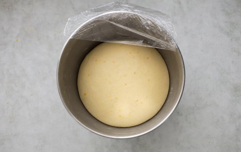 Nutella Christmas Wreath, step 3: the dough risen in a covered bowl