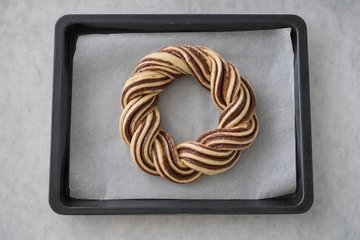 Nutella Christmas Wreath, step 6: the two strips twisted and shaped into a wreath